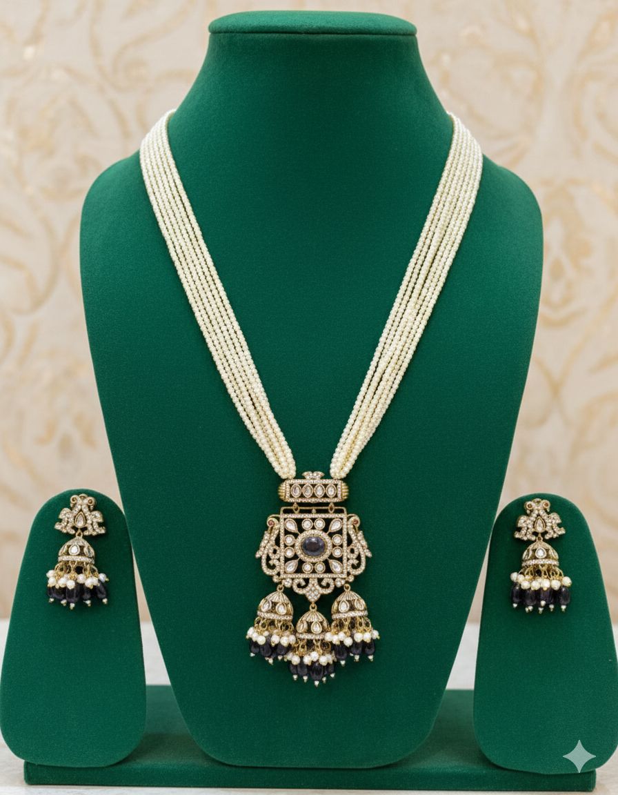Jewelry set with necklace and earrings on a green mannequin